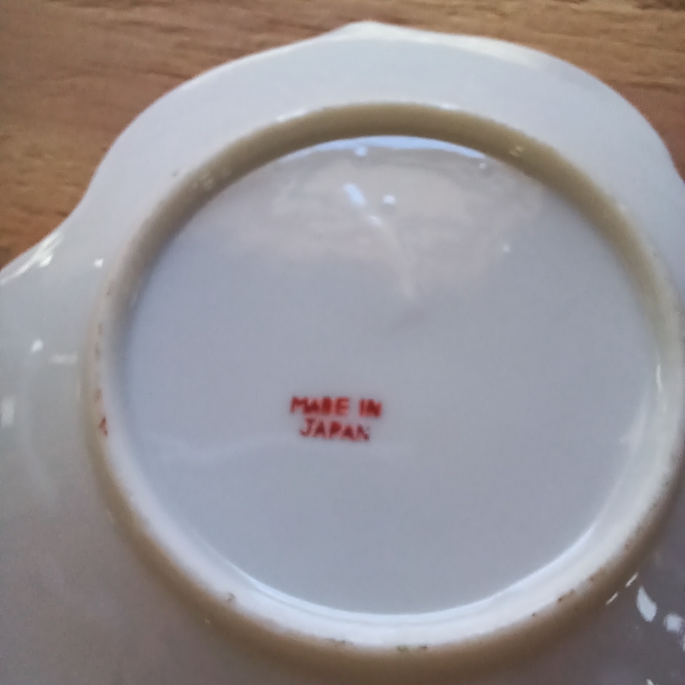Porcelain demitasse cup and saucer made in Japan